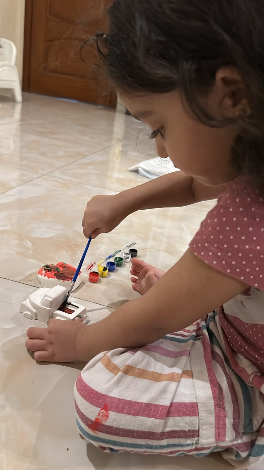 Baby girl painting Paint and Play toys